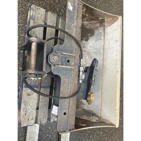 Schnellwechsler und Planierlöffel